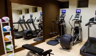 Fitness center with machines at the Hilton Garden Inn Krakow.