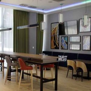 Bright hotel workspace at the Hampton by Hilton Olsztyn.