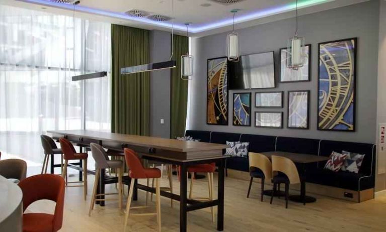 Bright hotel workspace at the Hampton by Hilton Olsztyn.