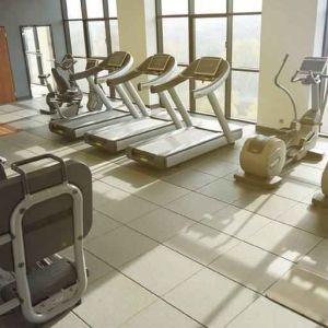 Fully equipped fitness center at the DoubleTree by Hilton Lodz.