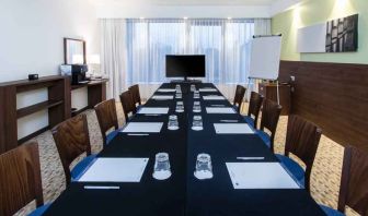 Meeting room with TV screen at the Hampton by Hilton Gdansk Oliwa.