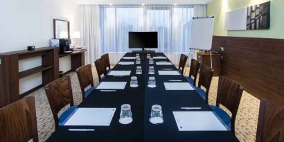 Meeting room with TV screen at the Hampton by Hilton Gdansk Oliwa.