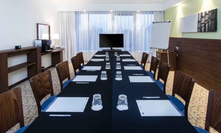 Meeting room with TV screen at the Hampton by Hilton Gdansk Oliwa.