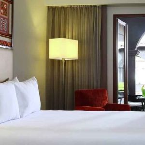 Queen room with working station overlooking the patio at the Hilton Garden Inn Cusco, Peru.