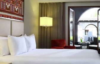 Queen room with working station overlooking the patio at the Hilton Garden Inn Cusco, Peru.