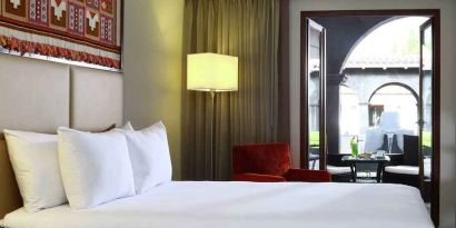 Queen room with working station overlooking the patio at the Hilton Garden Inn Cusco, Peru.