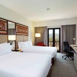 Twin room with desk at the Hilton Garden Inn Cusco, Peru.