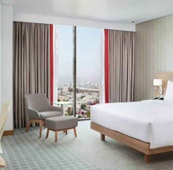 King superior room with desk at the Hilton Garden Inn Muscat Al Khuwair.