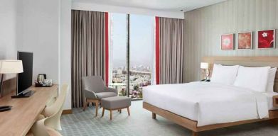 King superior room with desk at the Hilton Garden Inn Muscat Al Khuwair.