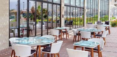 Outdoor seating perfect for co-working at the Hilton Garden Inn Muscat Al Khuwair.