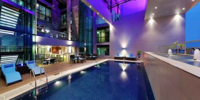 Swimming pool at the Legend Hotel Lagos Airport, Curio Collection by Hilton.