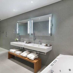 Spacious guest bathroom at the Legend Hotel Lagos Airport, Curio Collection by Hilton.