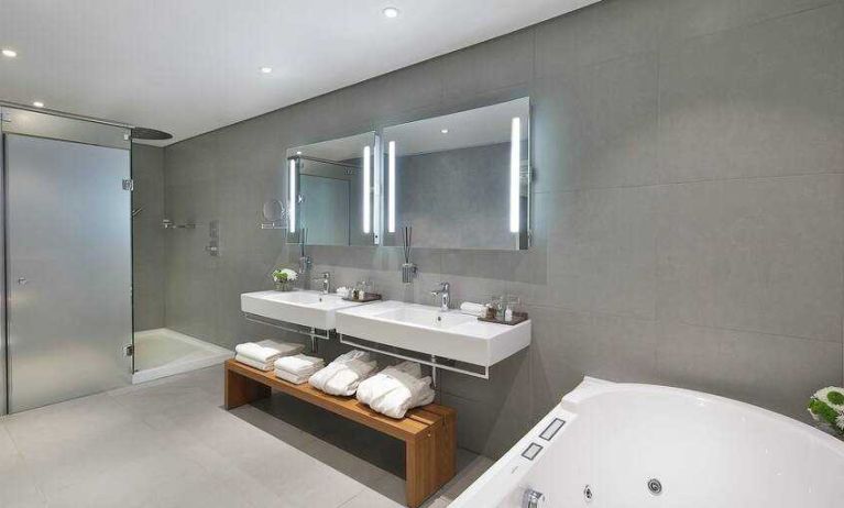 Spacious guest bathroom at the Legend Hotel Lagos Airport, Curio Collection by Hilton.