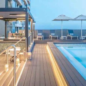 Outdoor pool area with lounges at the Hilton Garden Inn Umhlanga Arch.