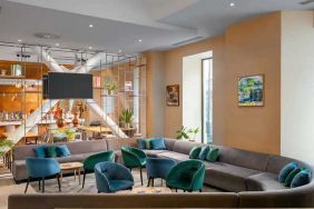 comfortable lobby and coworking space at Hilton Garden Inn Bucharest Old Town.