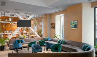 comfortable lobby and coworking space at Hilton Garden Inn Bucharest Old Town.