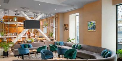 comfortable lobby and coworking space at Hilton Garden Inn Bucharest Old Town.