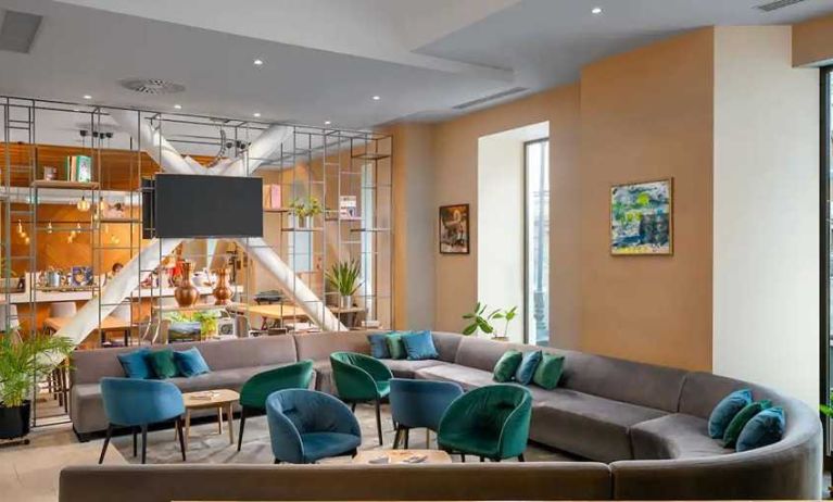 comfortable lobby and coworking space at Hilton Garden Inn Bucharest Old Town.