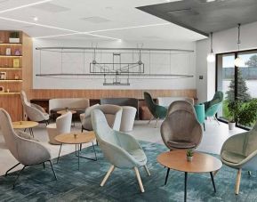 comfortable lobby and coworking space at Hilton Garden Inn Bucharest Airport.