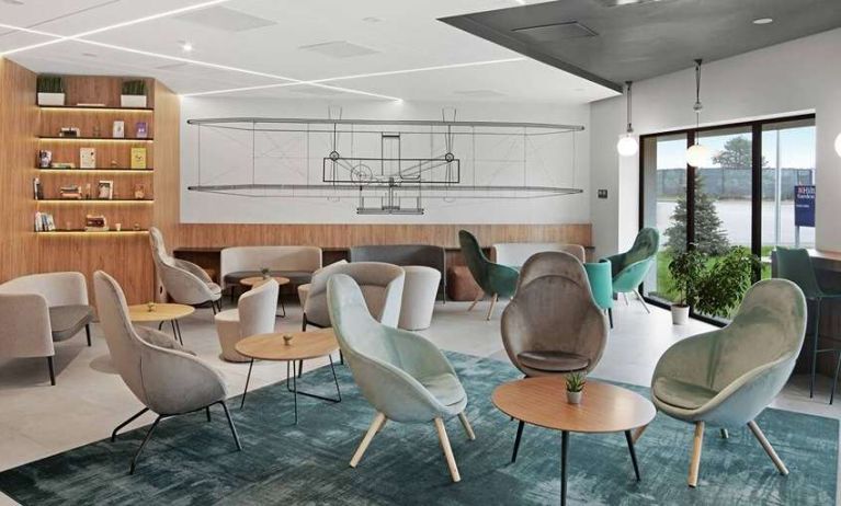 comfortable lobby and coworking space at Hilton Garden Inn Bucharest Airport.