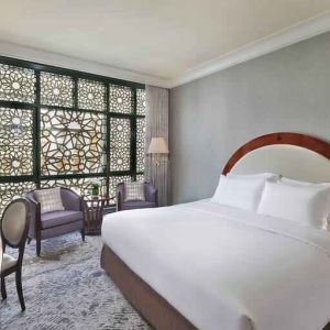 King bedroom with desk at the Madinah Hilton Hotel.