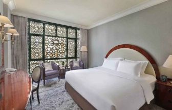 King bedroom with desk at the Madinah Hilton Hotel.