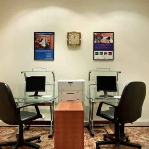 Business center with computers and printer at the Madinah Hilton Hotel.