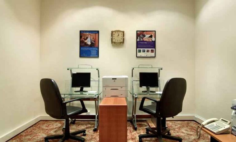 Business center with computers and printer at the Madinah Hilton Hotel.