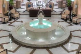 Lobby workspace with fountain at the Hilton Suites Makkah.