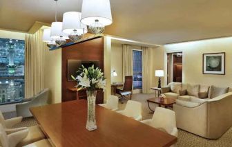 Living room with working station at the Conrad Makkah.