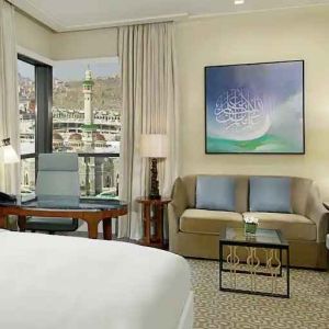 King bedroom with desk and sofa at the Conrad Makkah.