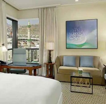 King bedroom with desk and sofa at the Conrad Makkah.