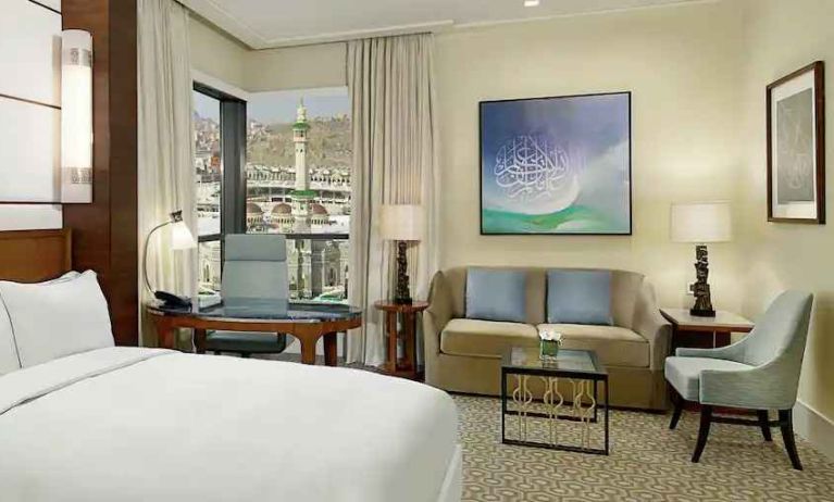 King bedroom with desk and sofa at the Conrad Makkah.