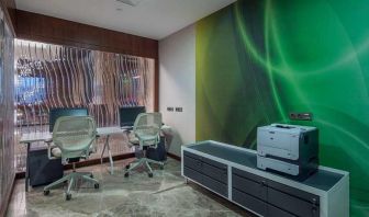 dedicated business center equipped with business desk, PC, internet, and printers at Hilton Garden Inn Istanbul Ataturk Airport.