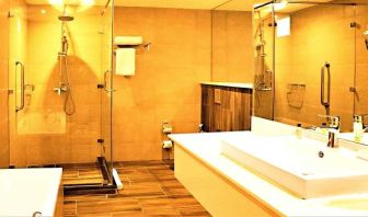 clean and spacious bathroom with shower at DoubleTree by Hilton Nairobi Hurlingham.