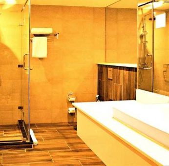 clean and spacious bathroom with shower at DoubleTree by Hilton Nairobi Hurlingham.