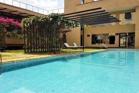 lovely outdoor pool with sun beds at DoubleTree by Hilton Nairobi Hurlingham.