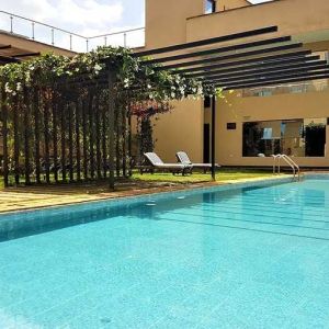 lovely outdoor pool with sun beds at DoubleTree by Hilton Nairobi Hurlingham.