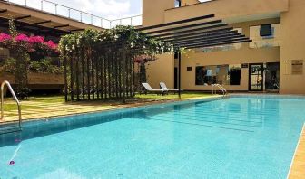 lovely outdoor pool with sun beds at DoubleTree by Hilton Nairobi Hurlingham.