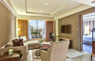 Living room with working station at the DoubleTree by Hilton Sukhumvit Bangkok.