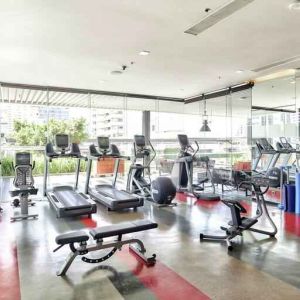 Fully equipped fitness center at the DoubleTree by Hilton Sukhumvit Bangkok.