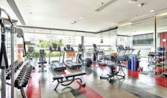 Fully equipped fitness center at the DoubleTree by Hilton Sukhumvit Bangkok.