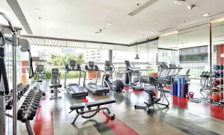 Fully equipped fitness center at the DoubleTree by Hilton Sukhumvit Bangkok.