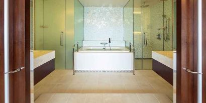 clean and spacious king bathroom with bath and shower at Hilton Fukuoka Sea Hawk.