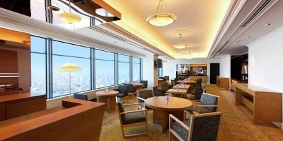 comfortable and spacious lobby and coworking space with lovely city views at Hilton Fukuoka Sea Hawk.