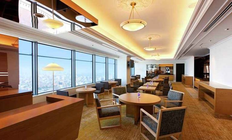 comfortable and spacious lobby and coworking space with lovely city views at Hilton Fukuoka Sea Hawk.