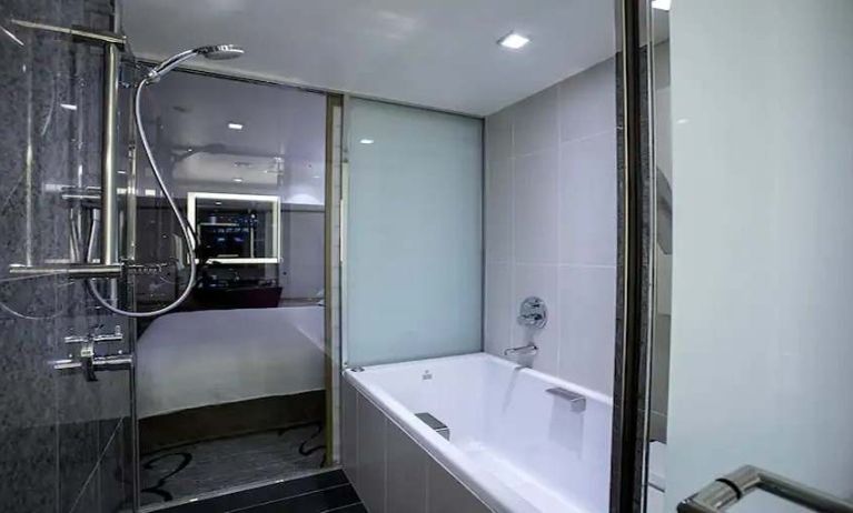 clean and spacious bathroom with bath and shower at Hilton Tokyo.