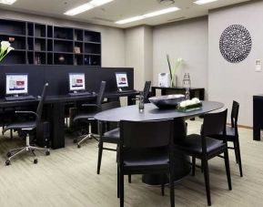 dedicated business center with business desk, PC, internet, and printers at Hilton Tokyo.