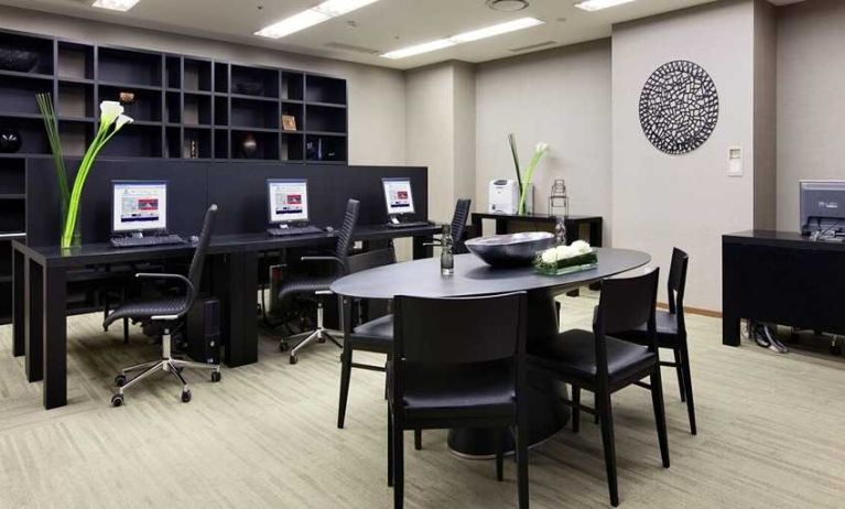 dedicated business center with business desk, PC, internet, and printers at Hilton Tokyo.