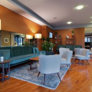 comfortable and spacious lobby and coworking space at Hilton Garden Inn Milan Malpensa.